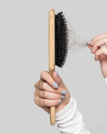 Hairbrush with shed hair